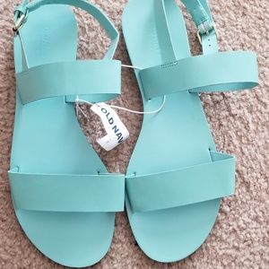 Turquoise flat sandals with ankle buckle